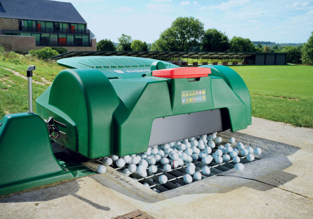 Ballpicker emptying in a drop pit solution
